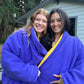 women in blue and gold 2 person sweater